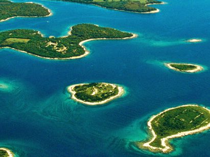 The turquoise islands of Brijuni National Park from the water.